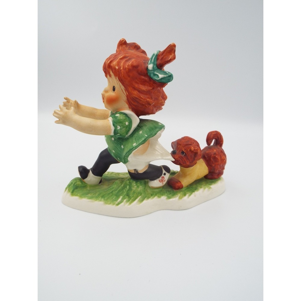 #43 - Goebel Hummel Figurine Girl with Dog Tugging Skirt